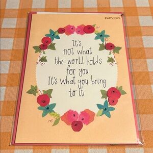 “It’s not what the world holds for you…”  Graduation Papyrus card